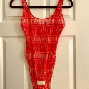 Red & white sheer Armani bodysuit.